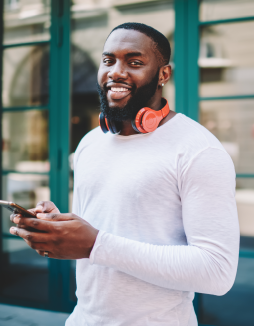 Man with blank long sleeve shirt and headphones